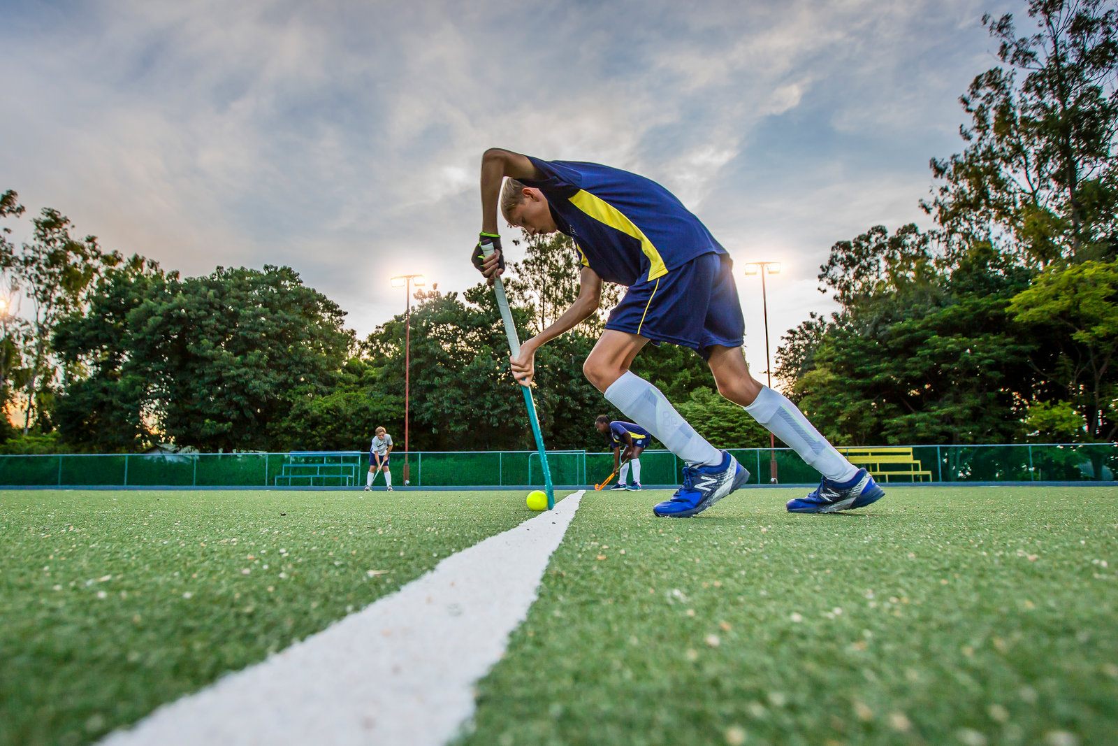 A pupil playing hockey